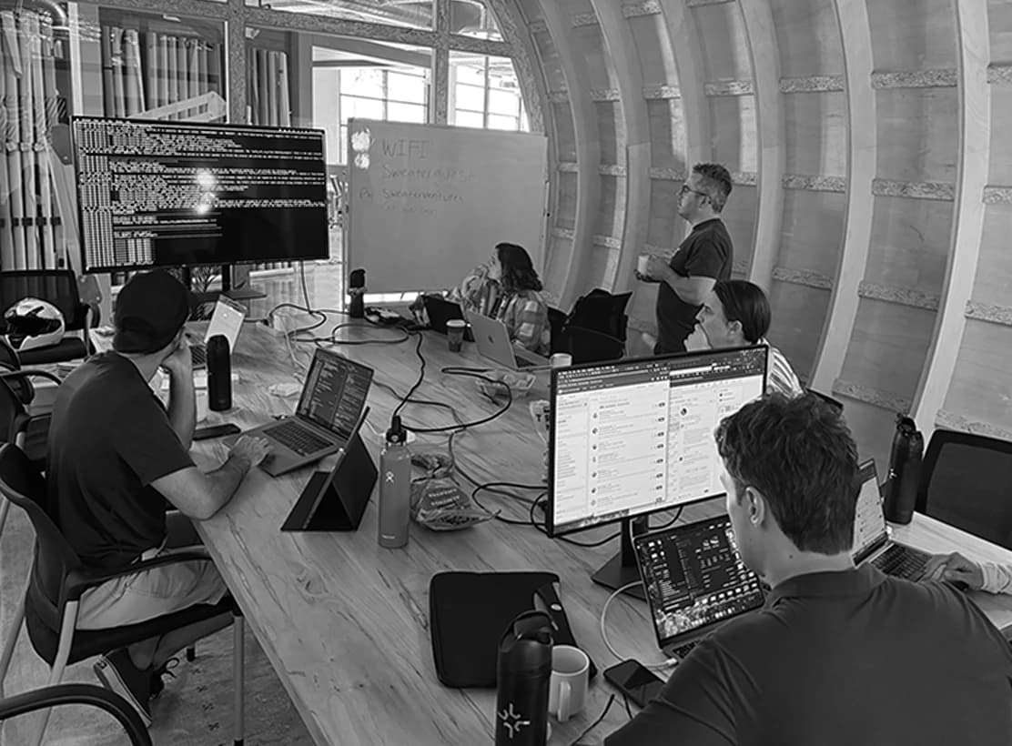 Gravity team members collaborating in their Boulder, Colorado office